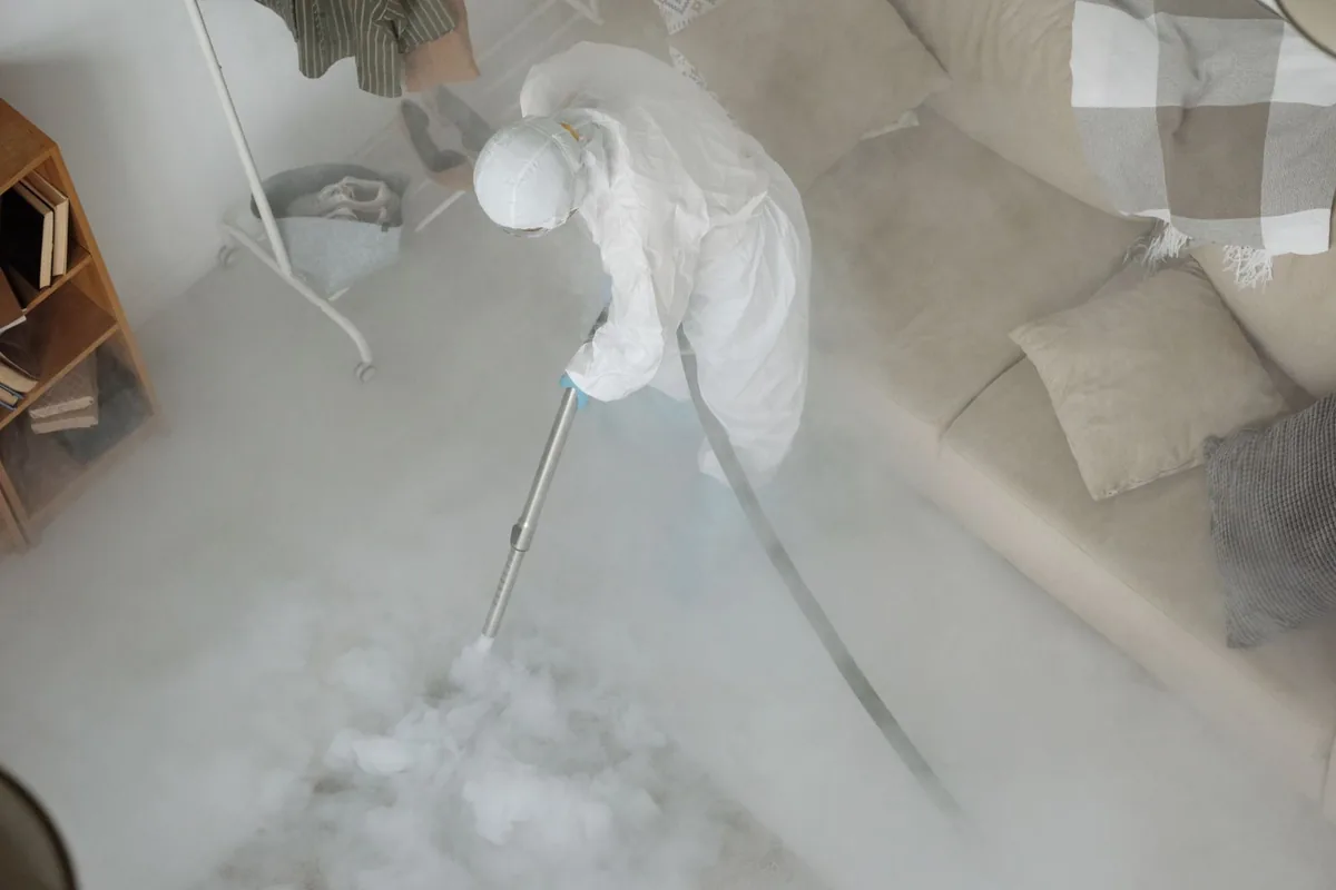 Biohazard cleanup technician in protective equipment, Searsport, ME